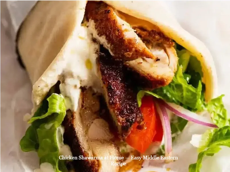 Chicken Shawarma at Home — Easy Middle Eastern Recipe 1 Delicious homemade chicken shawarma served with fresh vegetables and sauce